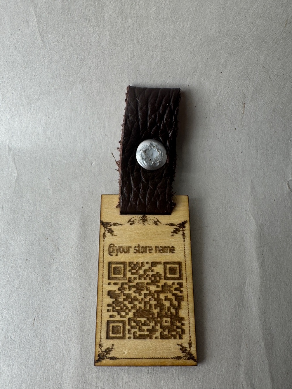 Concept keychain with real leather and wood